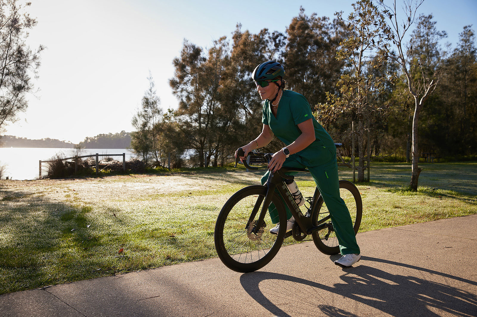 Emma Jeffcoat cycling in NNT scrubs